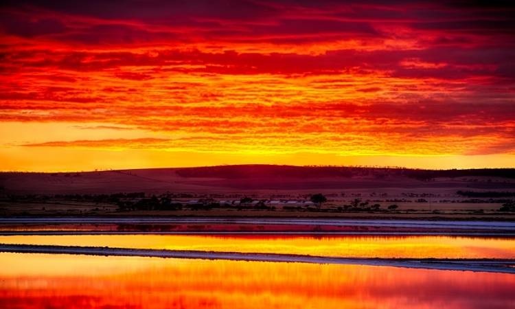 River reflecting colourful sunset