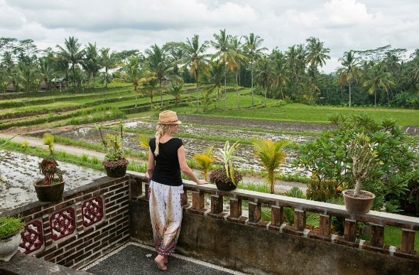  Woman looking out to the Bali rice fields 