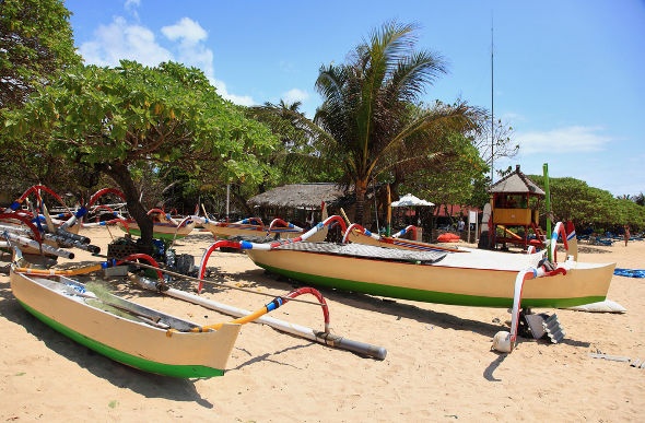  fishing boats parked on the shore  in Bali Nusa Dua