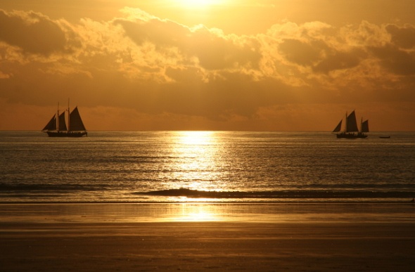 Two sail boats on the water