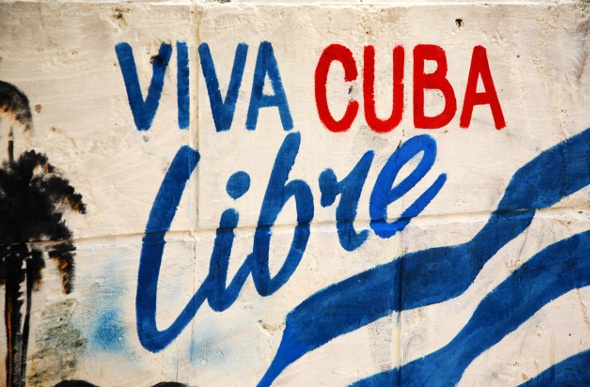  viva cuba libre painted on the wall with blue and red paint