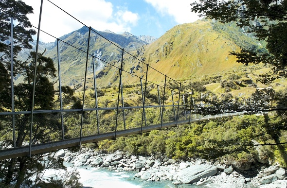  a hanging bridge across a lake in the Fiordland National Park