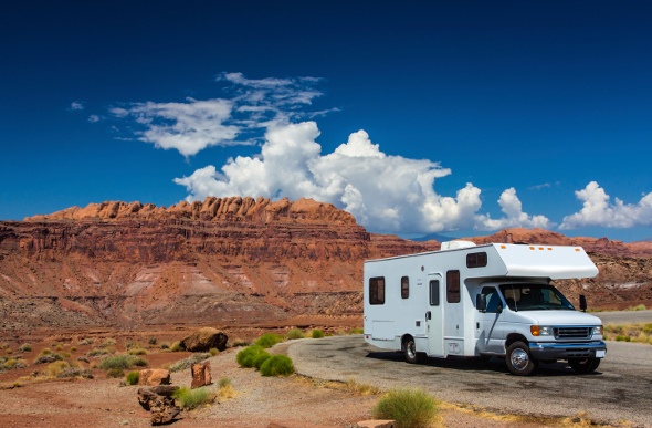  RV in the road with the view of the canyon