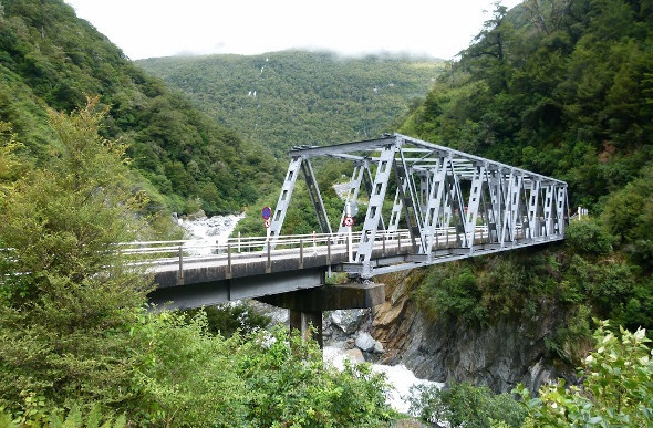 Gates of Haast bridge providing spectacular view of  the Haast River