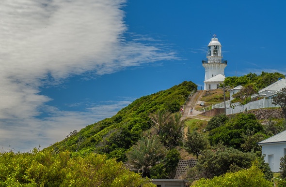  Smoky Cape Lighthouse stands against the sky near South West Rocks in New South Wales
