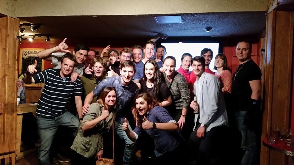  Group poses for a photo during their karaoke night out