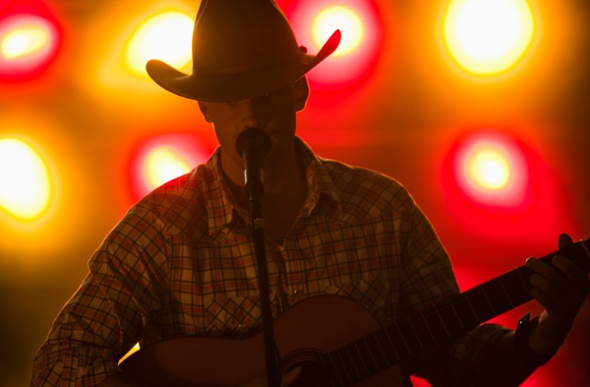  Country singer playing guitar 