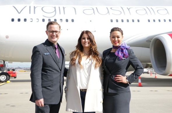  Virgin Australia cabin crew standing in front of the aircraft 