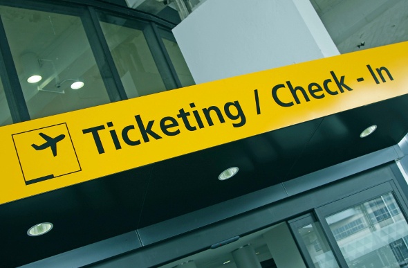 Ticketing and check in sign in the airport