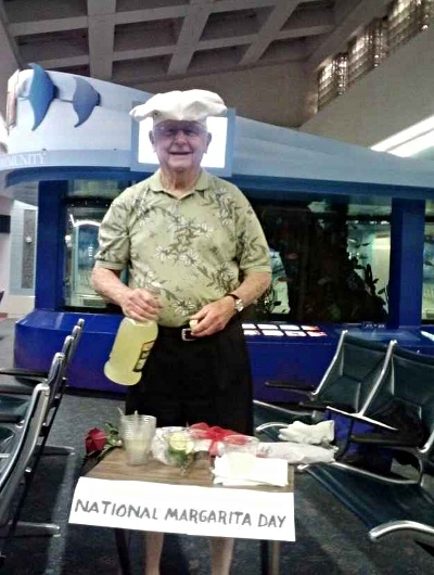  Man preparing a margarita in the airport 