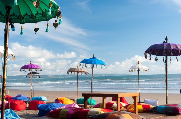 Colourful beachside seating and umbrellas in Bali 
