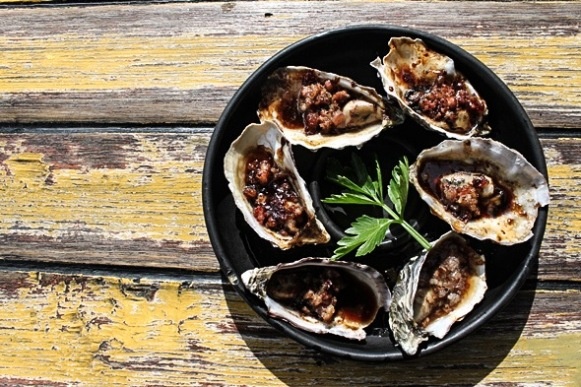 Cooked oysters presented on a plate