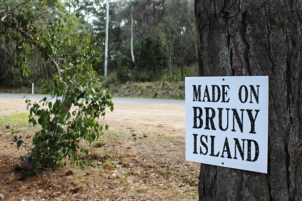 "Made on Bruny Island" signage attached to a tree