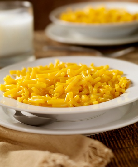 Macaroni and cheese served in a large white bowl