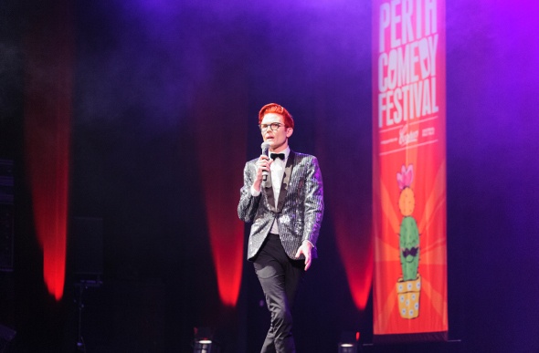  Rhys Nicholson on stage at the Perth Comedy Festival.