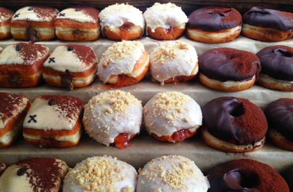  a display of assorted flavoured doughnuts