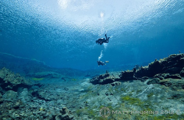  Two people scuba diving 