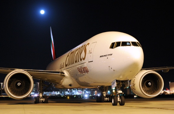 Emirates plane on the runway  