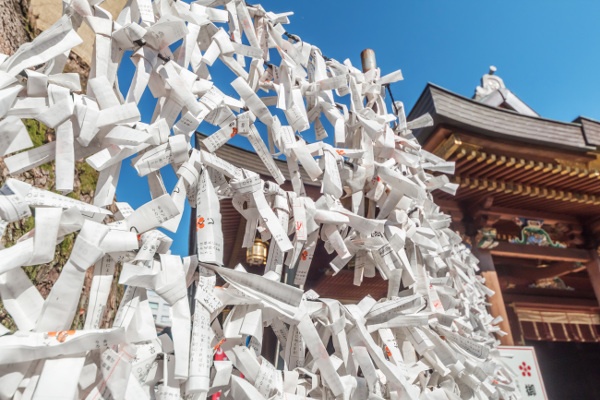  Japanese prayer papers hanged in front of the fortune temple