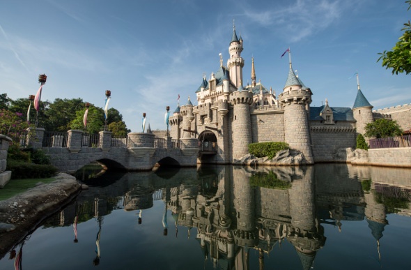 Hong Kong Disneyland's Castle reflecting in the lake