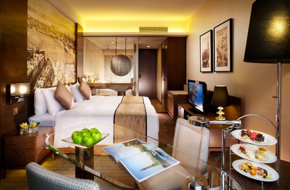 Inside the luxury brown and gold themed hotel room 