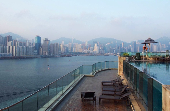 View of the Hong Kong cityscape from a poolside deck 
