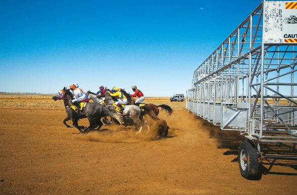 Horse racing taking place in Julia Creek, Australia