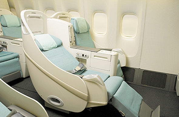  pastel blue Korean air prestige reclining seat with footrest