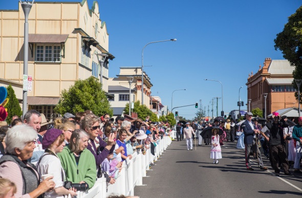 People dress up on period costume for the Grand Parade, which graces the streets of the Queensland city of Maryborough during the Mary Poppins Festival.