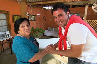  Miguel greeting locals 