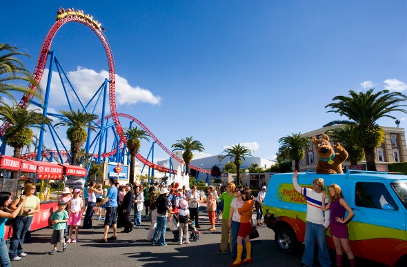 Tourists roaming around an amusement park