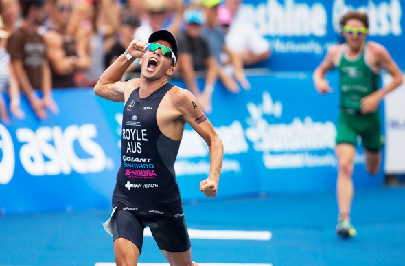 Aaron Royale in first place finishing the Noosa Triathlon