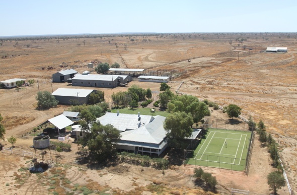 Aerial view of Camden (Outback) featuring its green features in the middle of the desert