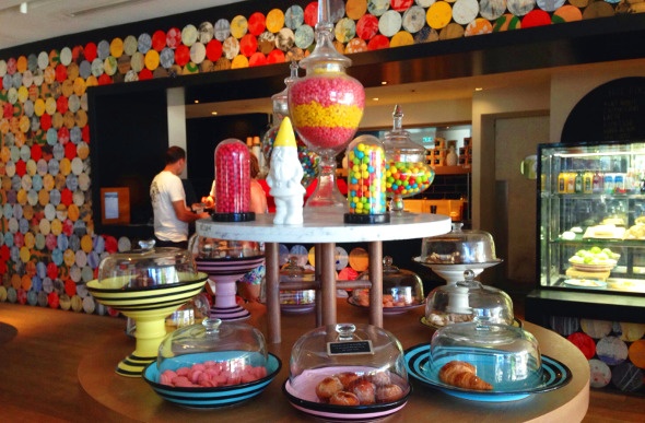 Variety of sweets and desserts displayed on a table in the café