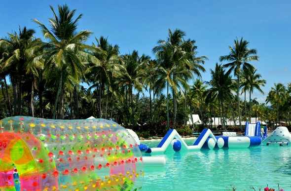  huge and colorful floater obstacles in a pool in Sheraton Mirage aqua play