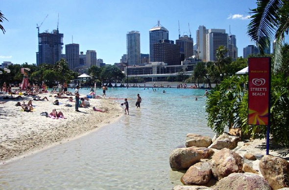  people taking a dip of the streets beach in southbank
