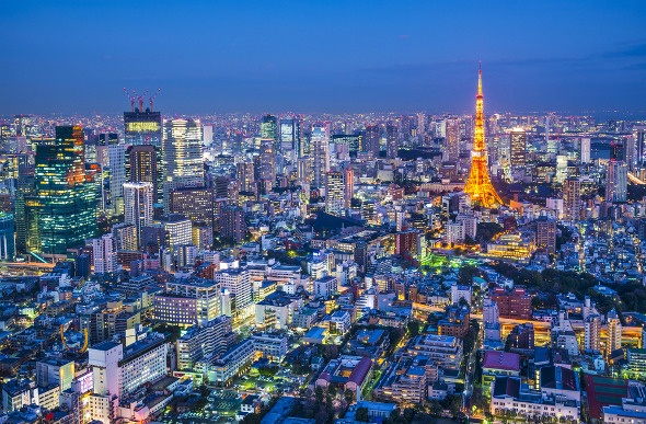 Tokyo Tower stands out among the city's bright skyline