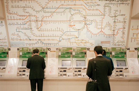 Tokyo subway train station ticket and information board