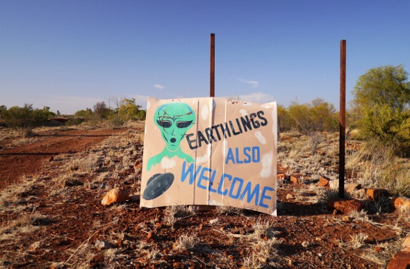 One of the abandoned place in Australia, showing a banner with a Alien face 
