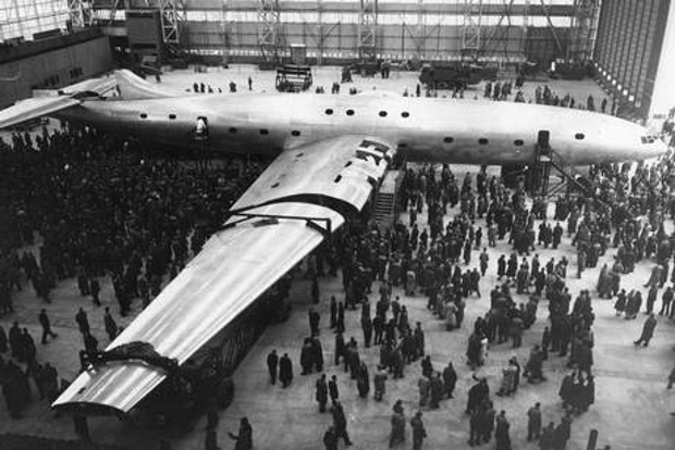 A380 airbus in black and white surrounded with people