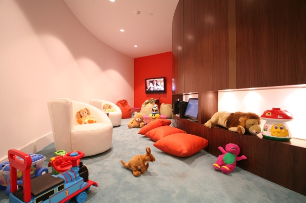 A view of the Etihad Family Room with games and toys scattered around
