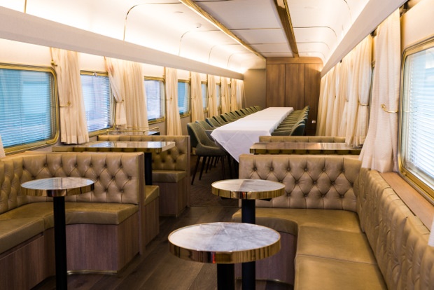 Hi-end dining room with leather seats inside a train
