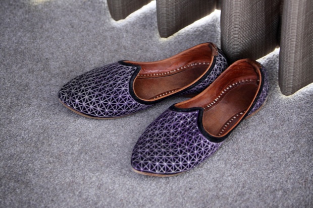 purple slippers with brown leather insole