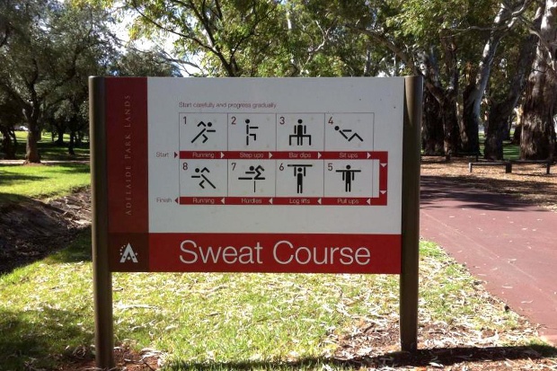 a signage showing information about the sweat course