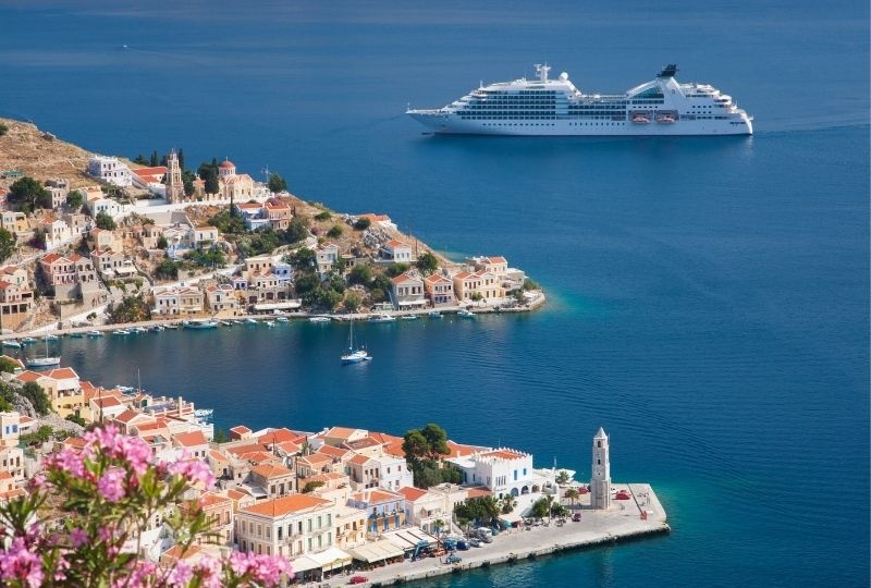 Image overlooking Greece with a cruise ship sailing past