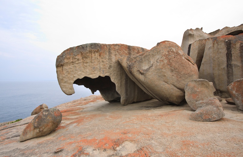 Enormous stone remains at the edge of the cliff overlooking the sea