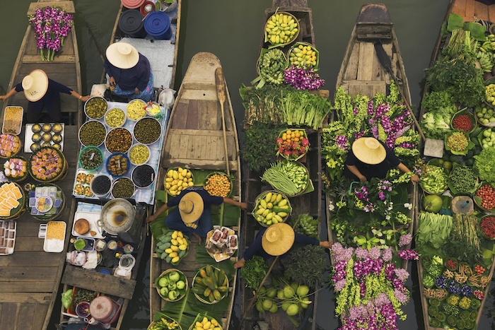 boats laden with fresh produce in Thailand - floating market