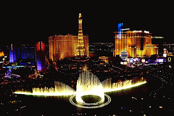 The Las Vegas skyline with the Bellagio Fountain water show at night.