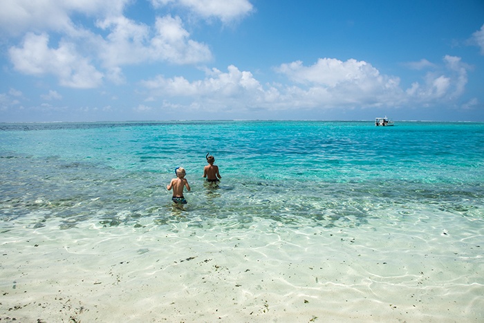 kids playing in water in vanuatu