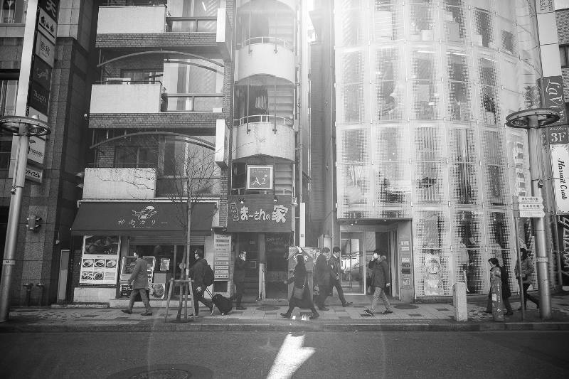 people walking on street in tokyo